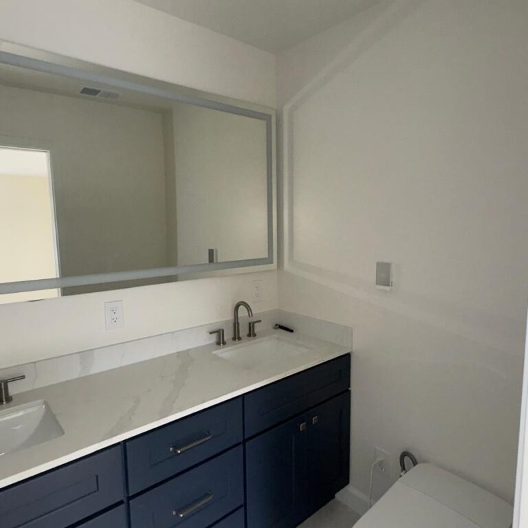 A fresh, modern bathroom with a clean white paint